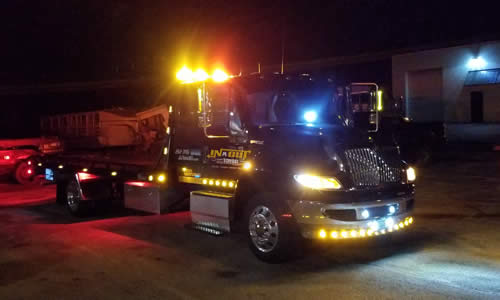 Contact In-N-Out Towing Book Towing Service near me